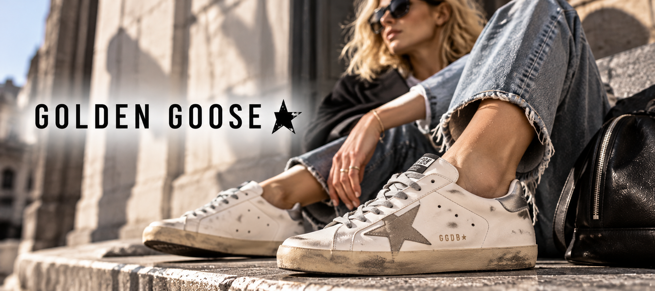 Golden Goose sneakers worn by a stylish woman in an urban setting with the Golden Goose logo; shop online Golden Goose sneakers and clothing shipped from Europe at Urbalenti.