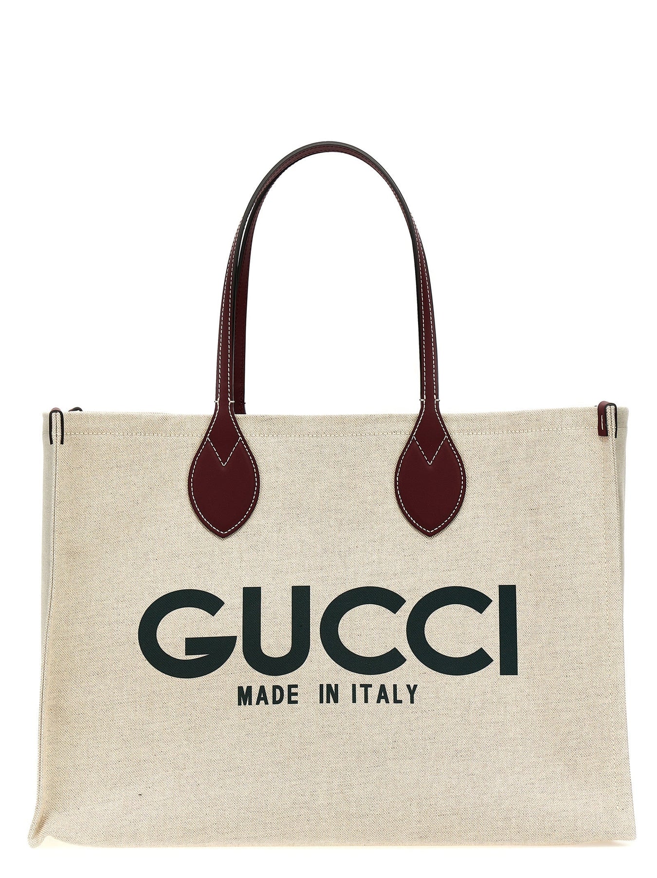 Gucci Bags collection featuring a stylish beige tote bag with the iconic Gucci logo, showcasing the premium craftsmanship and contemporary design that defines Gucci.