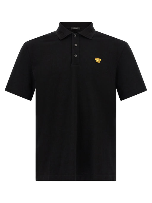 Front view of the Versace Medusa Polo Shirt featuring the iconic Medusa logo patch in a striking black color, perfect for the Fall - Winter 2026/2027 collection by Versace. Ideal for fashion-forward men looking to elevate their wardrobe. Men > Clothing > Shirts.