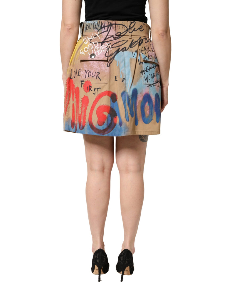 Mini-jupe beige en mélange de coton à imprimé graffiti Dolce & Gabbana