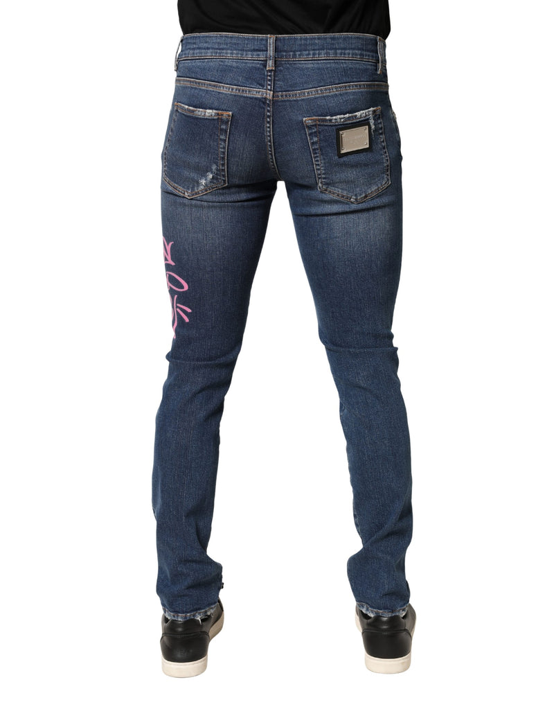 Calça jeans skinny azul Dolce & Gabbana com estampa de grafite desgastada
