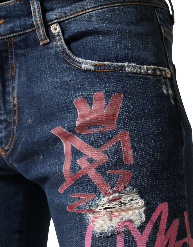 Calça jeans skinny azul Dolce & Gabbana com estampa de grafite desgastada