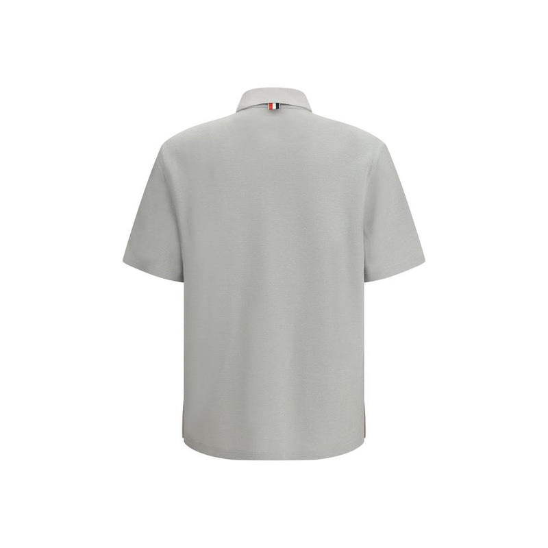 Polo de algodón gris de Thom Browne