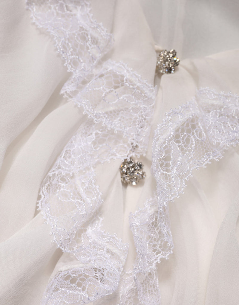 Blusa blanca de manga larga con ribete de encaje y volantes de Dolce & Gabbana