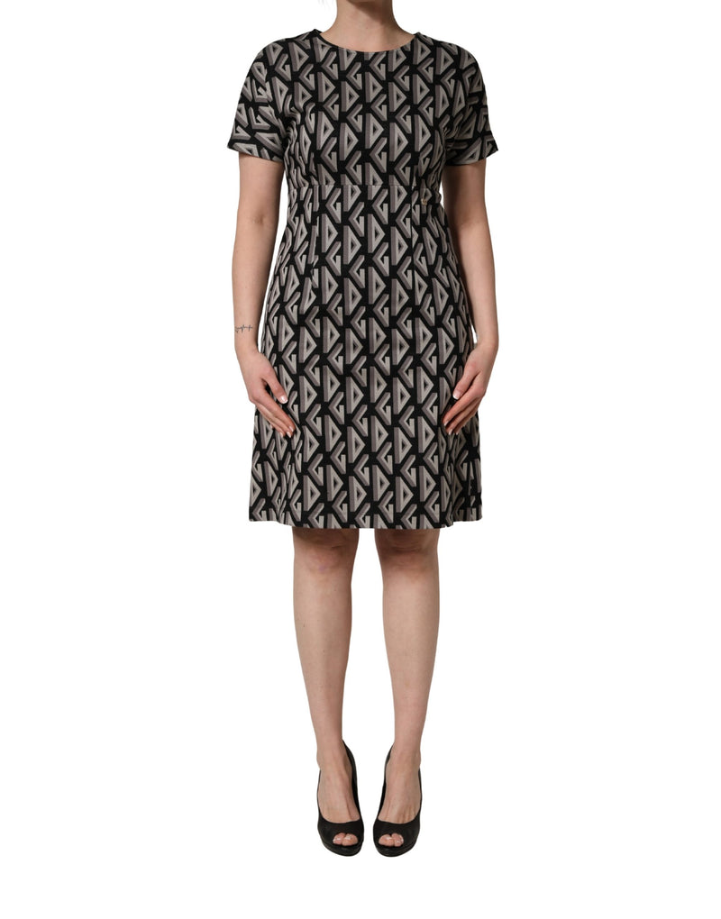 Vestido preto Dolce & Gabbana de algodão com estampa de logo e comprimento até o joelho