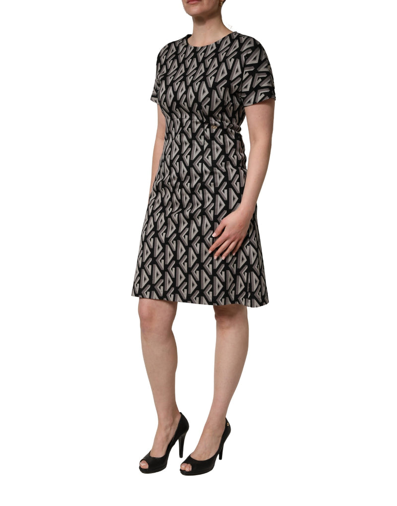 Vestido preto Dolce & Gabbana de algodão com estampa de logo e comprimento até o joelho