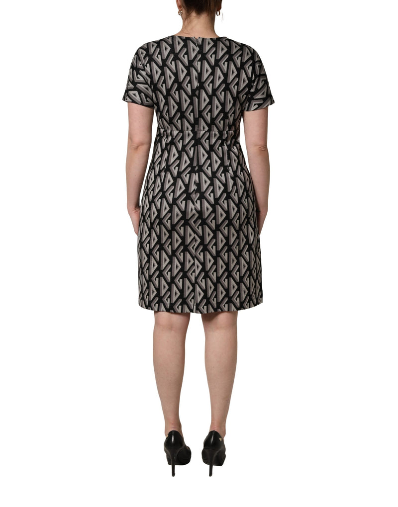 Vestido preto Dolce & Gabbana de algodão com estampa de logo e comprimento até o joelho