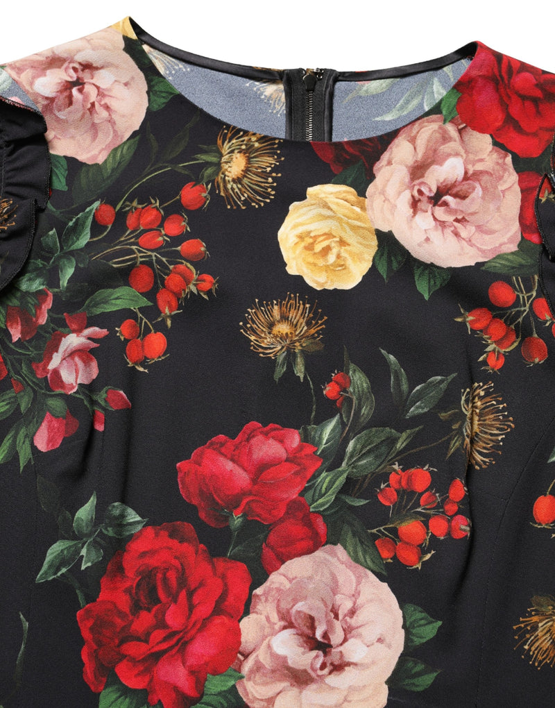 Blusa negra de crepé con estampado floral y detalle de volantes de Dolce & Gabbana