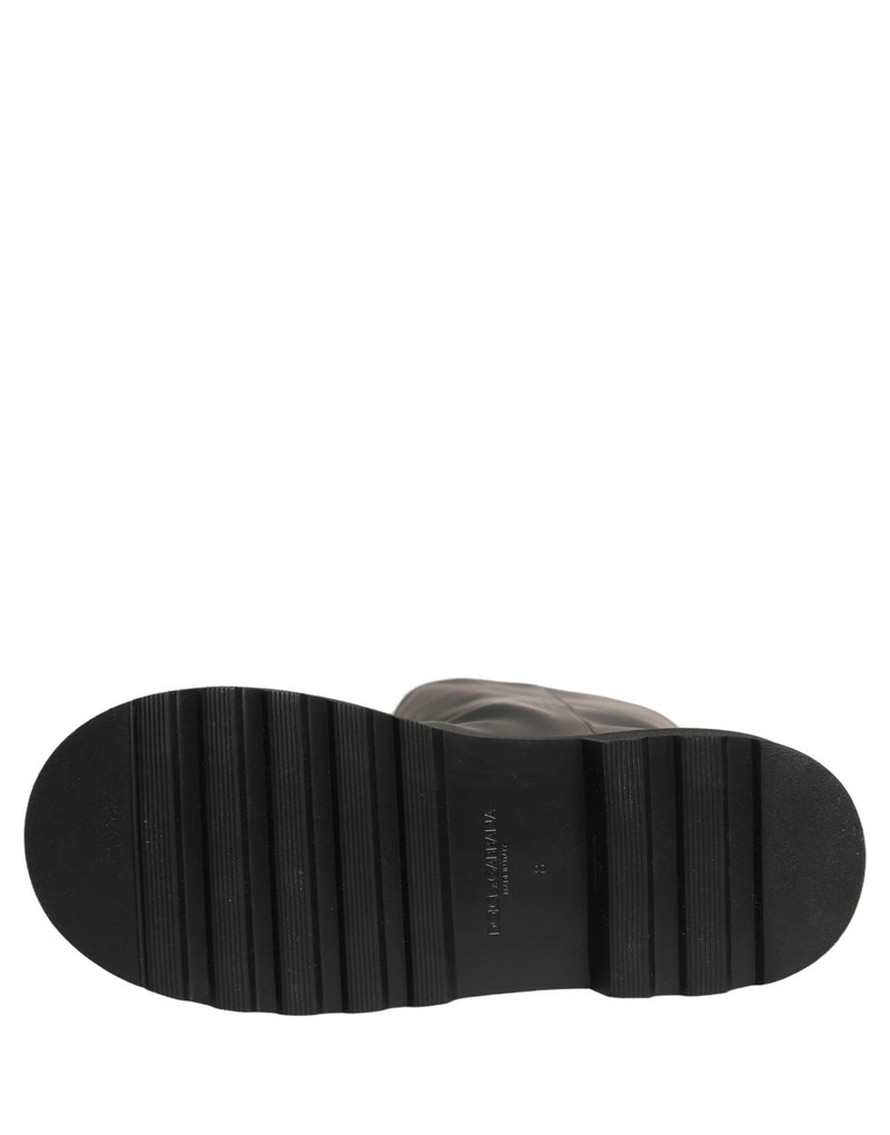 Botas para hombre de cuero negro y suela gruesa de Dolce & Gabbana, de media caña