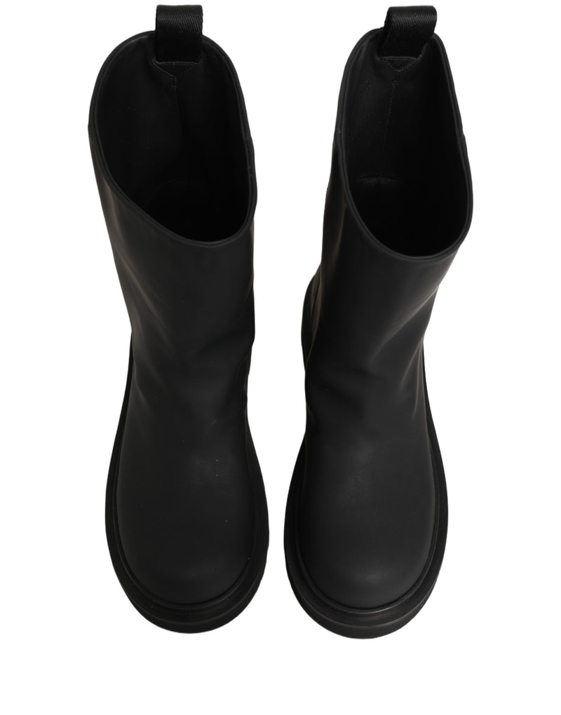 Botas para hombre de cuero negro y suela gruesa de Dolce & Gabbana, de media caña