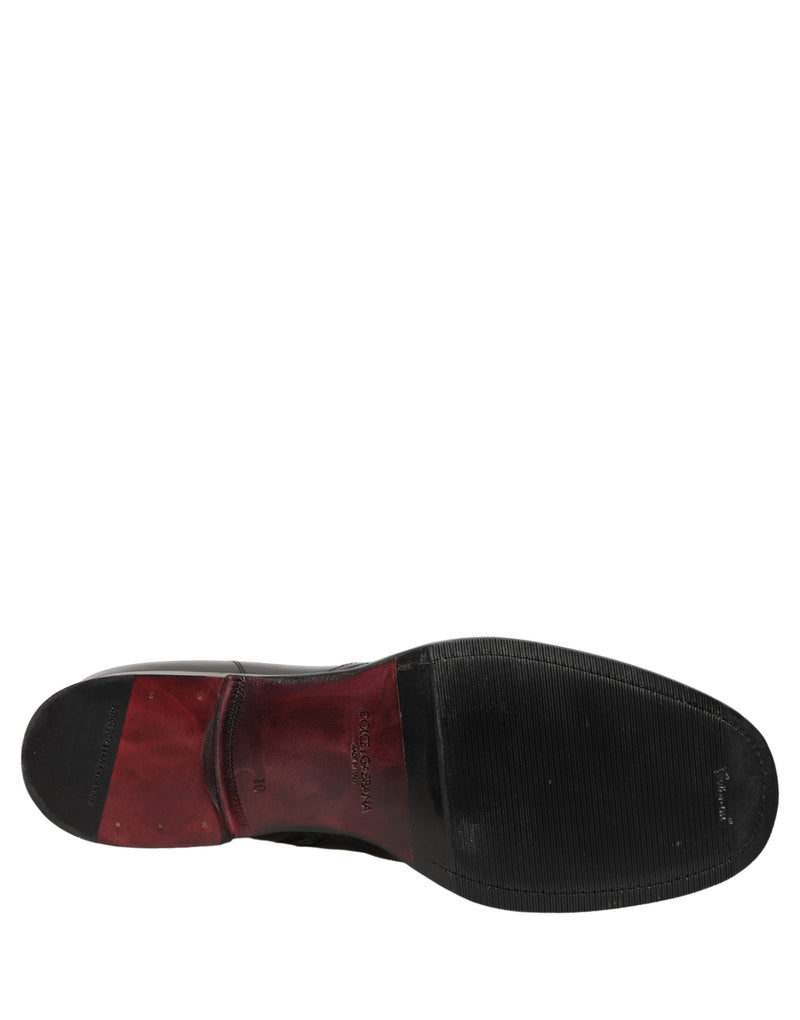 Botines de cuero negro con logo en relieve de Dolce & Gabbana