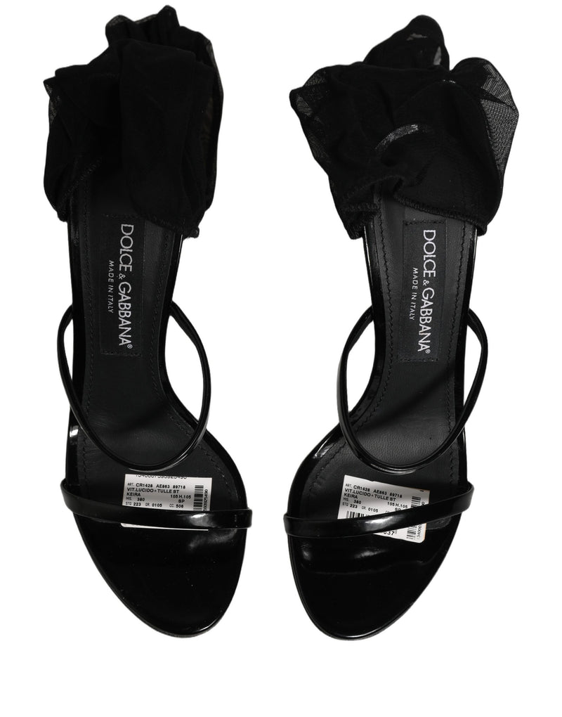 Botas negras hasta la rodilla con tacón de aguja y calcetín de Dolce & Gabbana