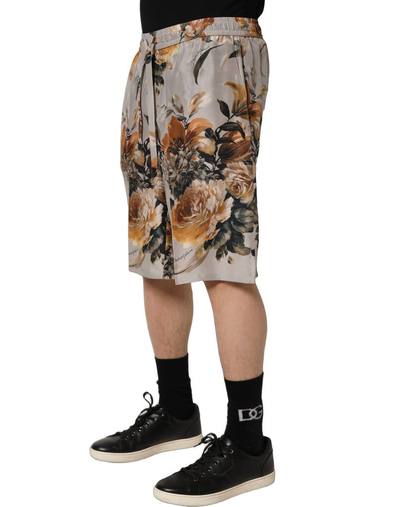 Pantalones cortos bermuda de seda con estampado floral beige para hombre de Dolce & Gabbana