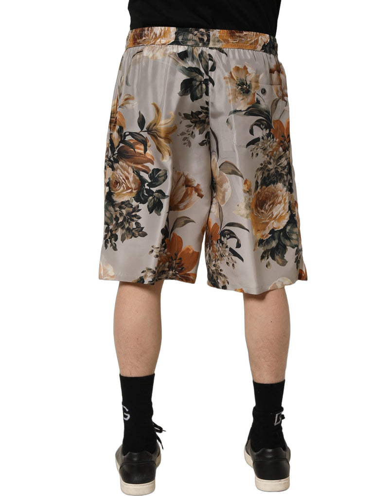 Pantalones cortos bermuda de seda con estampado floral beige para hombre de Dolce & Gabbana
