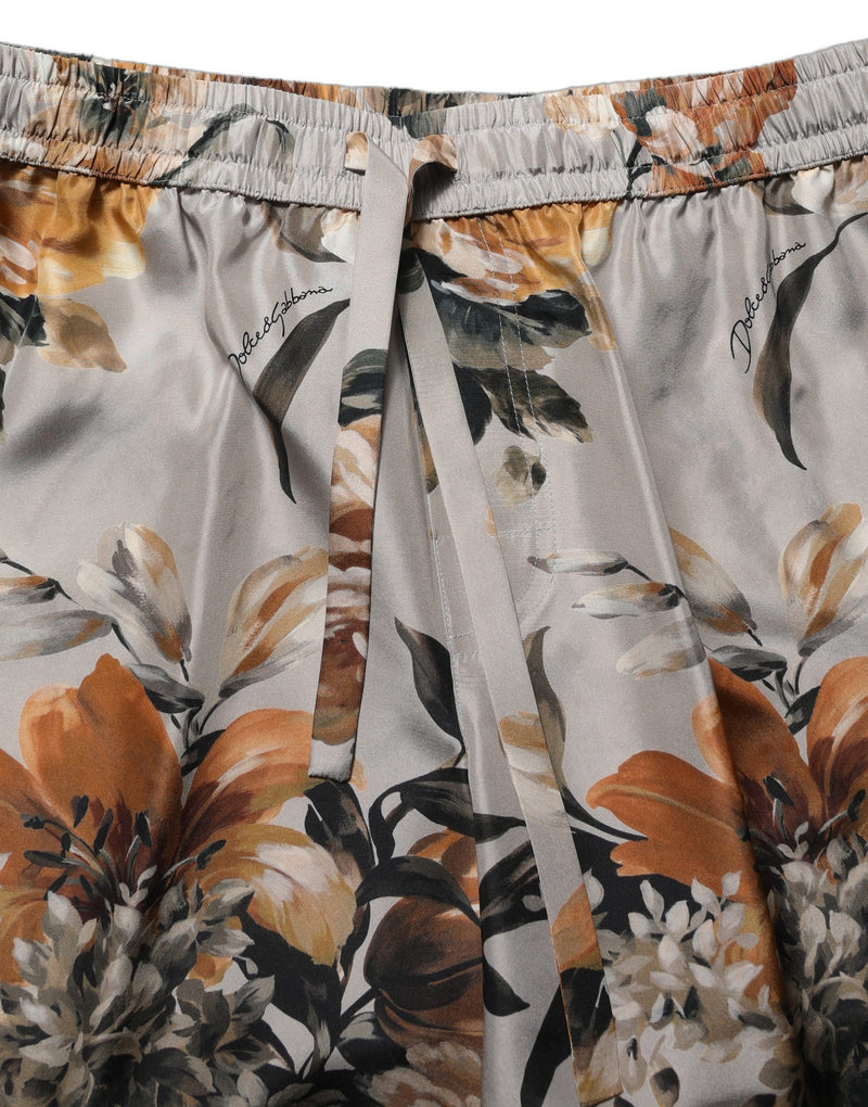 Pantalones cortos bermuda de seda con estampado floral beige para hombre de Dolce & Gabbana