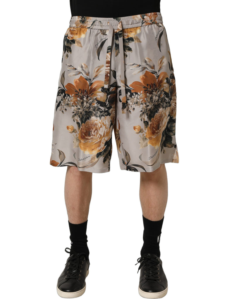Pantalones cortos bermuda de seda con estampado floral beige para hombre de Dolce & Gabbana