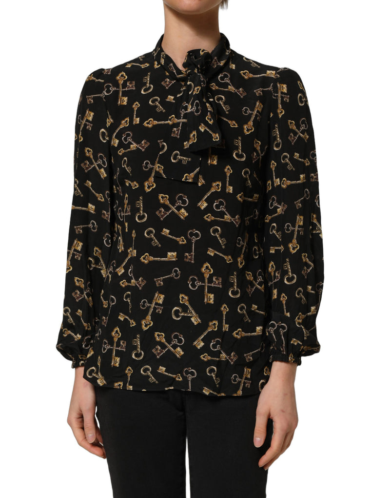 Blusa preta de seda com estampa de chaves e gola com laço Dolce & Gabbana