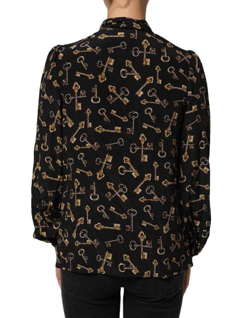 Blusa preta de seda com estampa de chaves e gola com laço Dolce & Gabbana