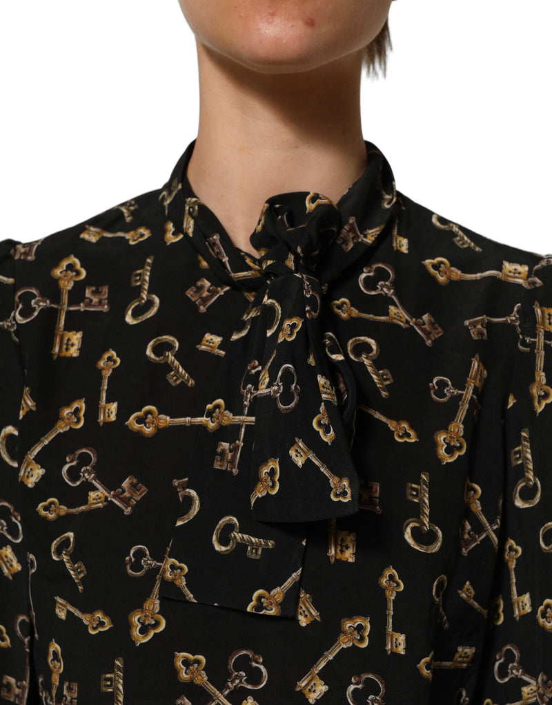 Blusa preta de seda com estampa de chaves e gola com laço Dolce & Gabbana