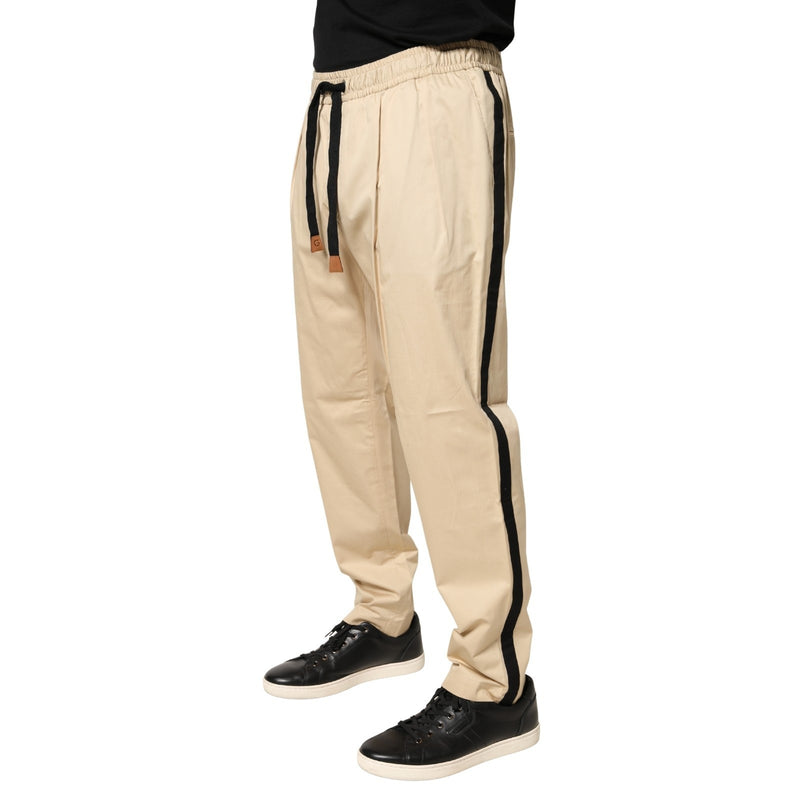 Pantalon jogger skinny beige en coton Dolce & Gabbana pour homme