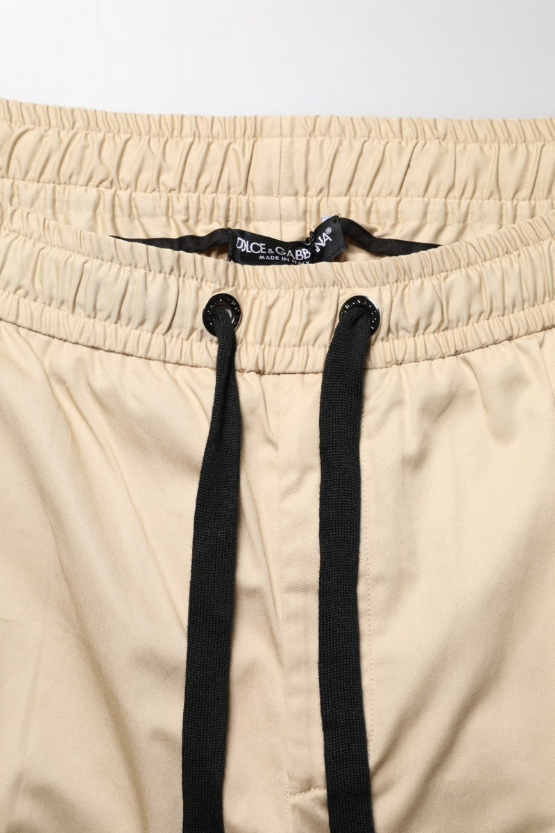 Pantalon jogger skinny beige en coton Dolce & Gabbana pour homme