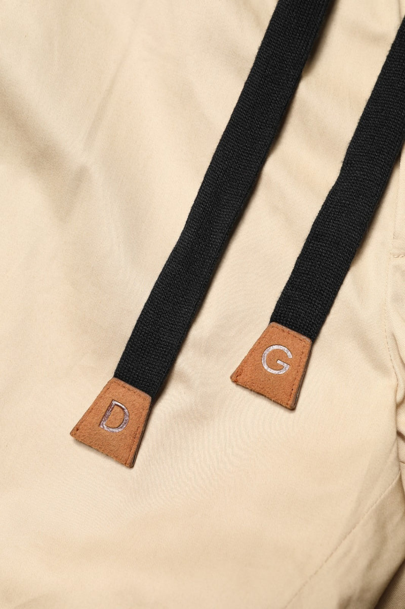 Pantalon jogger skinny beige en coton Dolce & Gabbana pour homme