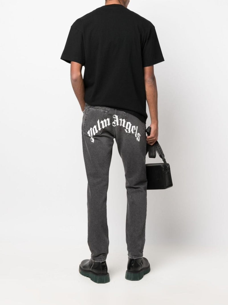 Palm Angels Curved Logo denim jeans | Urbalenti™ NYC