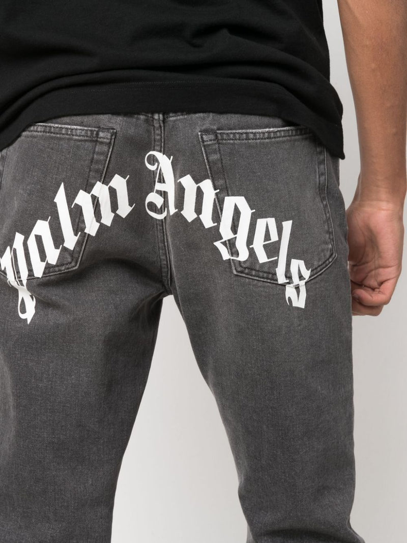 Palm Angels Curved Logo denim jeans | Urbalenti™ NYC