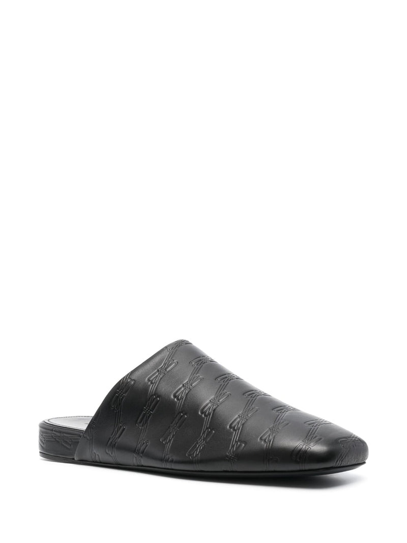 Balenciaga debossed-logo leather mules | Urbalenti™ NYC