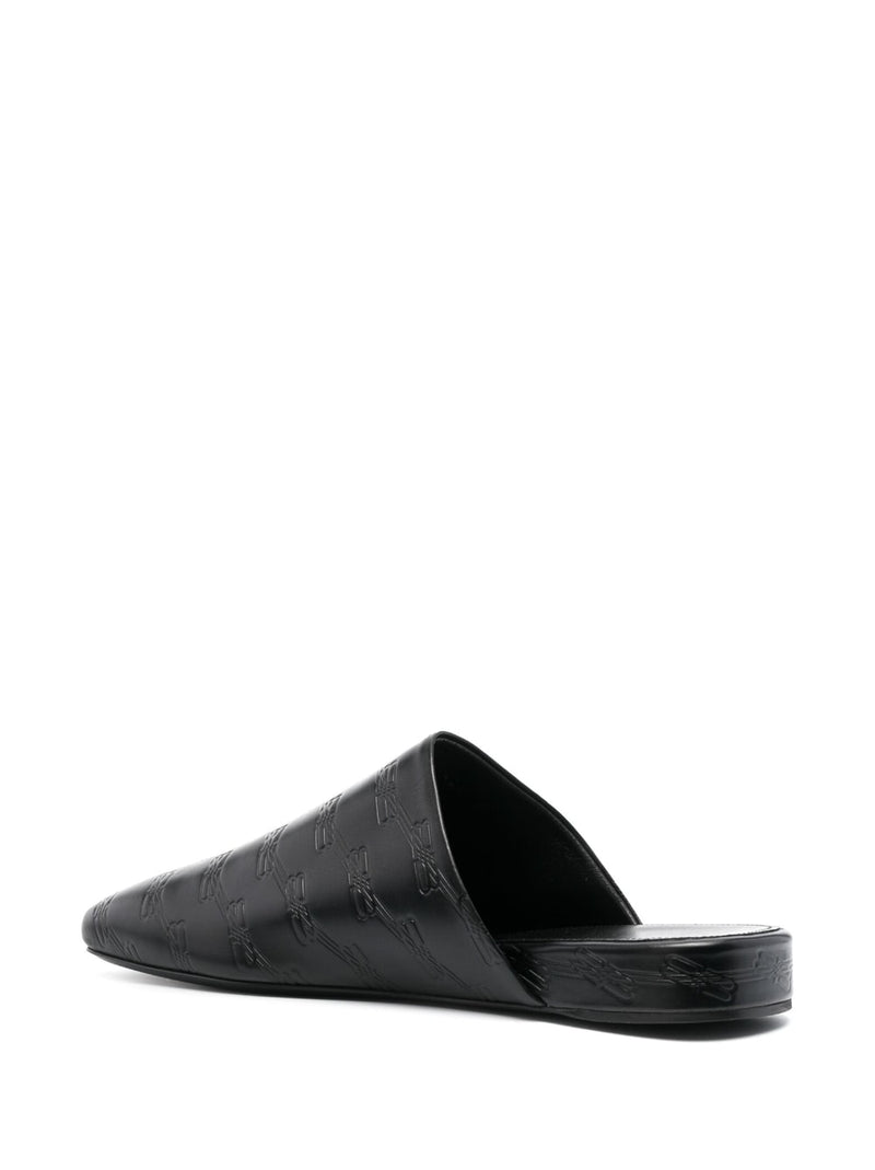 Balenciaga debossed-logo leather mules | Urbalenti™ NYC
