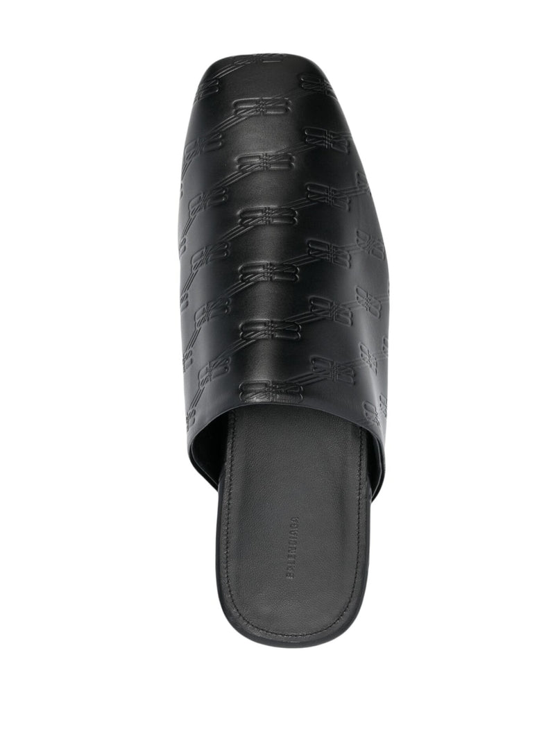 Balenciaga debossed-logo leather mules | Urbalenti™ NYC