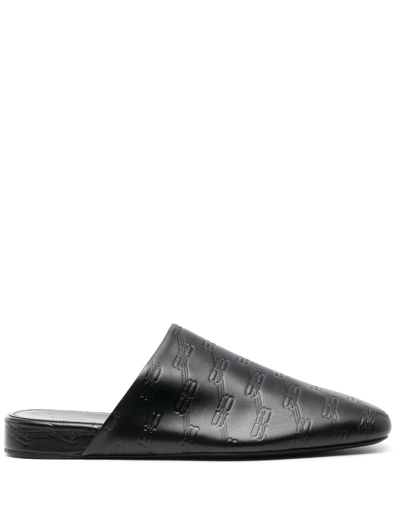 Balenciaga debossed-logo leather mules | Urbalenti™ NYC