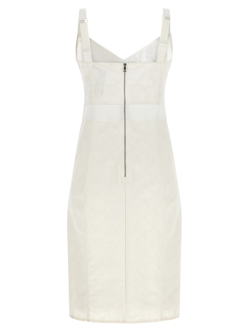 Back view of the Dolce & Gabbana White Polyamide Midi Dress | White, a Dolce & Gabbana Midi Dress showcasing the exposed back zip, fitted corset construction, lace texture, and smooth white polyamide midi skirt. This Women’s Clothing piece is listed in Dresses - Clothing and Midi - Dresses - Clothing; White, IT44, New with tags, in-stock, Discount_60-69, 13879, 79680700467.