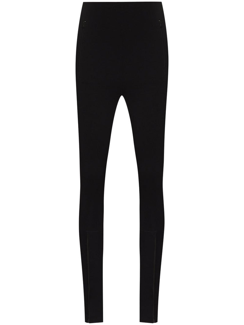 032C Black Front Zip Leggings with Zipped Pockets & Elastic Waistband showcased in a stylish, high-quality image, representing authentic designer fashion. This piece is part of the curated luxury collections shipped from Milano, featuring premium craftsmanship that highlights contemporary aesthetics. Discover curated luxury collections at competitive prices, fulfilled from Milan, Italy, and express delivered worldwide with confidence.