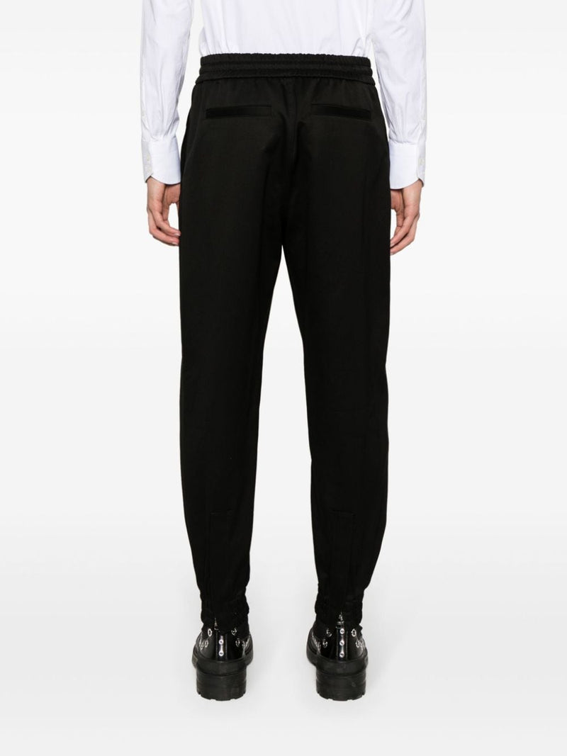 Alexander McQueen Tapered-leg cotton trousers | URBALENTI™