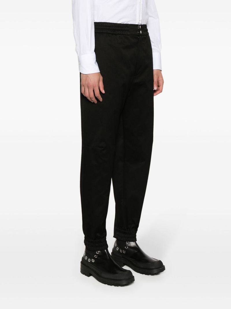Alexander McQueen Tapered-leg cotton trousers | URBALENTI™