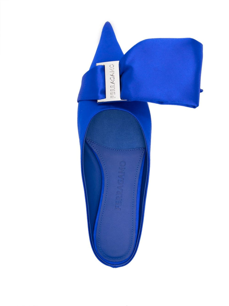 Ferragamo asymmetric-bow Satin Mules | Urbalenti™ NYC