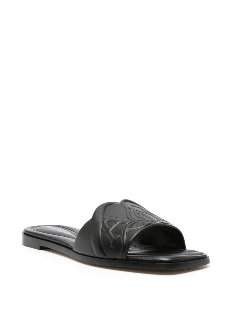 Alexander McQueen logo-embossed leather sandals | Urbalenti | Urbalenti™... | Urbalenti™ NYC