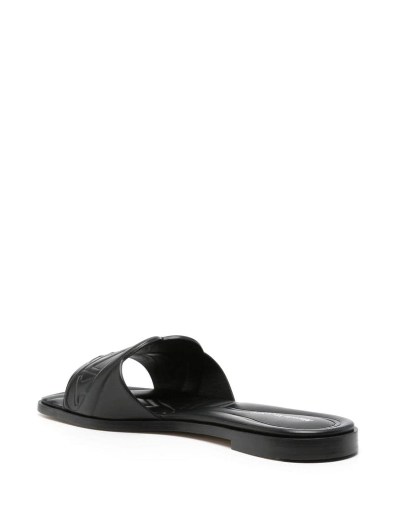 Alexander McQueen logo-embossed leather sandals | Urbalenti | Urbalenti™... | Urbalenti™ NYC