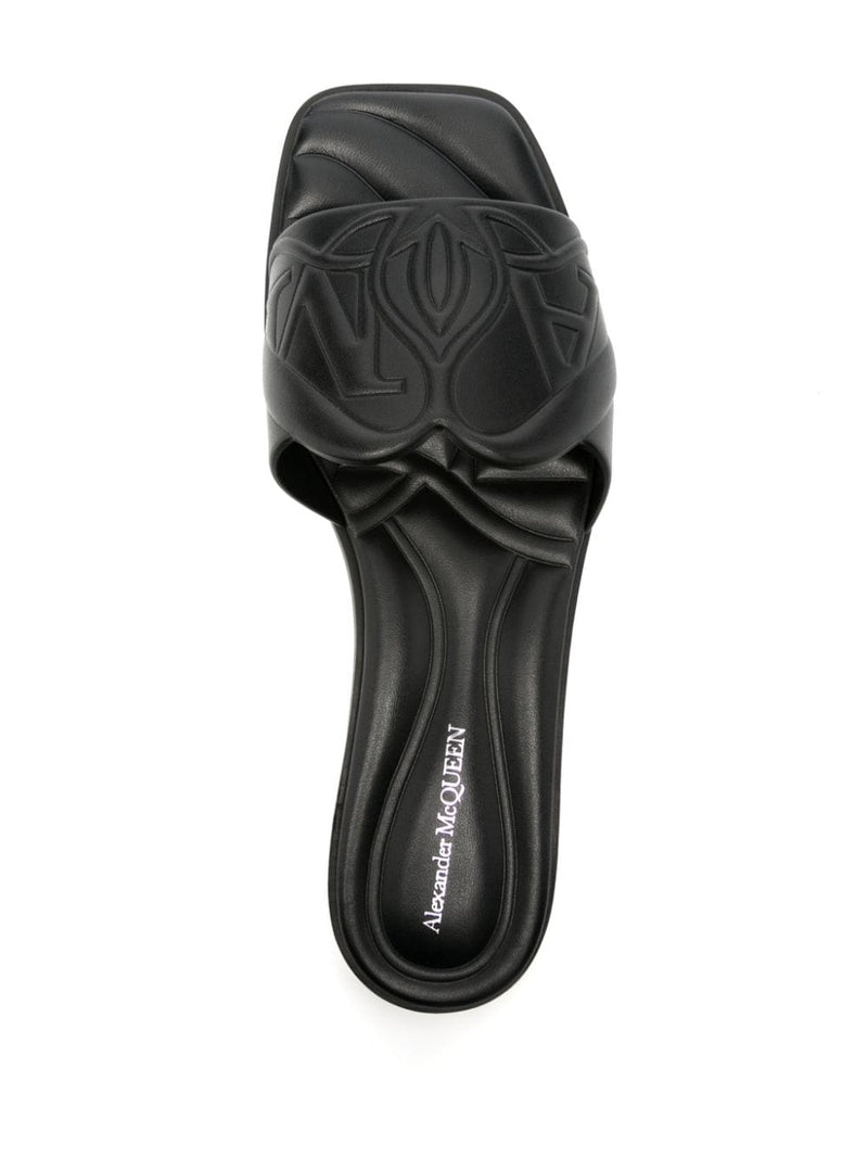 Alexander McQueen logo-embossed leather sandals | Urbalenti | Urbalenti™... | Urbalenti™ NYC