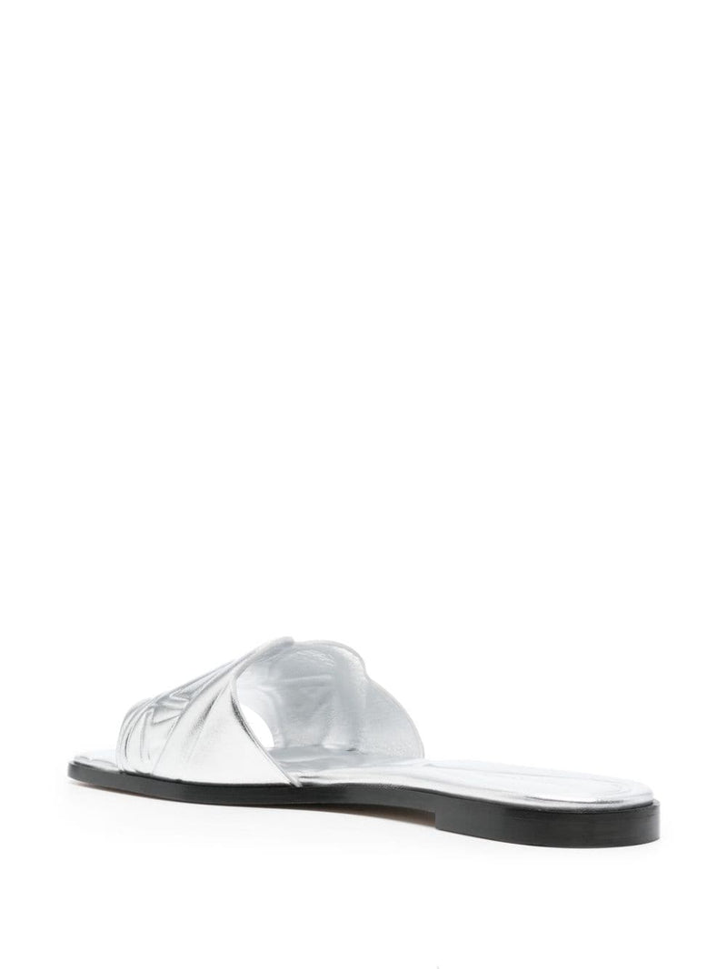 Alexander McQueen Slide sandals with embossed logo | Urbalenti | Urbalen... | Urbalenti™ NYC