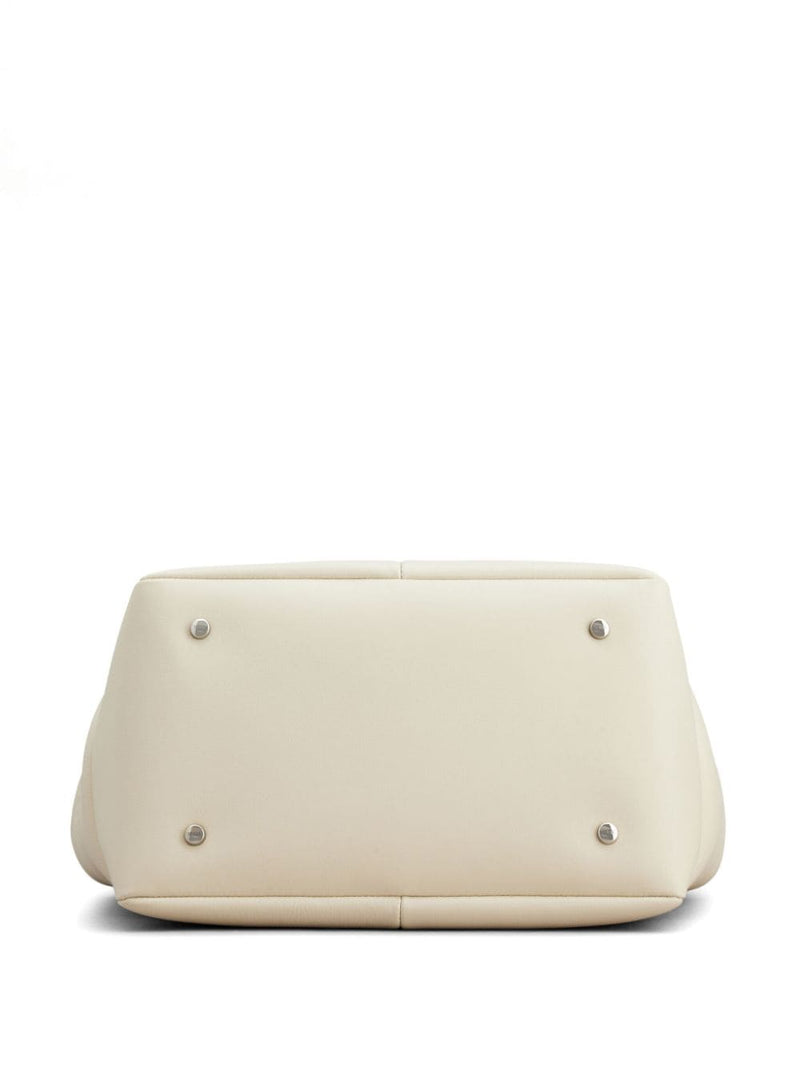 Bottom view of the durable Tod's Di Leather Tote Bag, showcasing its quality and craftsmanship. This bag, from Tod's, is designed for women who appreciate functionality and style in their accessories for Spring - Summer 2024, included in Women > Bags > Shopper.