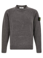 Front view of the Stone Island Gray Cotton Cardigan for Men | Gray, a refined Stone Island Cardigan for Men in soft gray cotton with a ribbed crew neck, raglan sleeves, and signature compass badge. Ideal for Men in sizes L, M, XL, and XXL; New with tags, in-stock, Gray, 13879, 79680700467, Cardigans - Sweaters - Clothing, Clothing, Discount_30-39, Stone Island, Sweaters - Clothing.