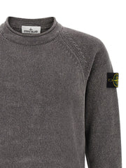 Close-up front detail of the Stone Island Gray Cotton Cardigan for Men | Gray, highlighting the ribbed crew neck, fine cotton knit, raglan sleeve design, and Stone Island compass badge. A stylish Stone Island Cardigan for Men, New with tags and in-stock in Gray for sizes L, M, XL, and XXL; 13879, 79680700467, Cardigans - Sweaters - Clothing, Clothing, Discount_30-39, Men, Stone Island, Sweaters - Clothing.