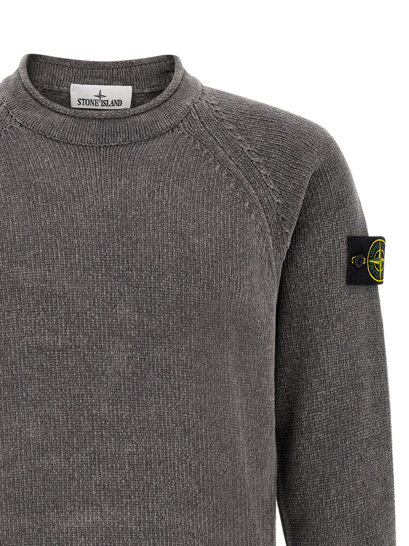 Close-up front detail of the Stone Island Gray Cotton Cardigan for Men | Gray, highlighting the ribbed crew neck, fine cotton knit, raglan sleeve design, and Stone Island compass badge. A stylish Stone Island Cardigan for Men, New with tags and in-stock in Gray for sizes L, M, XL, and XXL; 13879, 79680700467, Cardigans - Sweaters - Clothing, Clothing, Discount_30-39, Men, Stone Island, Sweaters - Clothing.