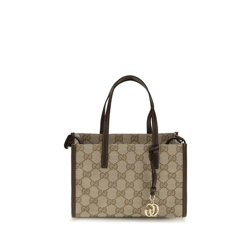 Gucci Beige Cotton Shoulder Bag | Beige, front view of a Gucci Shoulder Bag with signature GG monogram, leather top handles, and Double G charm. 13879, 79661334579, Bags, Beige, Discount_20-29, Gucci, in-stock, New with tags, Shoulder Bags - Bags, Women.