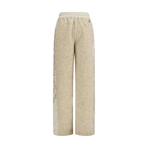 Moncler Beige Polyester Joggers for women (Workout Pants) | Beige, rear view of relaxed-fit teddy-effect fleece joggers with nylon side panels. Moncler Workout Pants for Women, Beige Clothing and Sportswear - Clothing, sizes S, M, and L, New with tags, in-stock, Discount_40-49, Joggers (workout pants) - Sportswear - Clothing, product code 13879 and 79661334579.