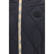 Burberry Black Nylon Shell Jacket for men – back view highlighting the regular fit, adjustable hood and hem, and distinctive Check design. Burberry Black Nylon Shell Jacket for mens.