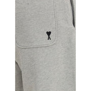 Ami Paris Gray Cotton Sweatsuit close-up showing the gray cotton back pocket with contrasting Ami de Cœur logo embroidery.