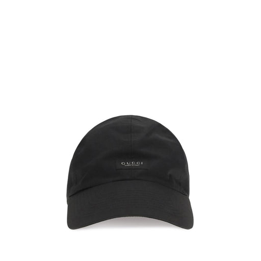 Front view of the Gucci Black Cotton Baseball Cap with Embroidered Logo, a stylish Gucci Baseball Cap in Black with a curved visor for Men. Available at Urbalenti NYC, product 13879, style 79661334579, Accessories, Caps (Baseball Hat) - Hats - Accessories, Discount_30-39, Gucci, Hats - Accessories, in-stock, sizes L, M and S, New with tags.